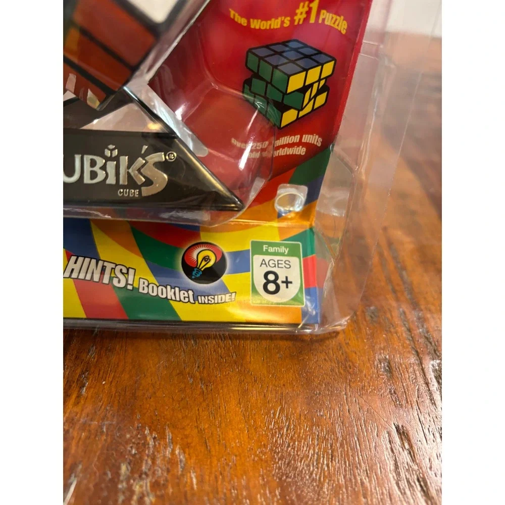 Milton Bradley Rubiks Cube 3x3 Puzzle with Stand and Booklet 54033 New Sealed